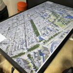 Es ist ein Bildschirm mit einem 3D-Modell von Wiesbaden zu sehen.