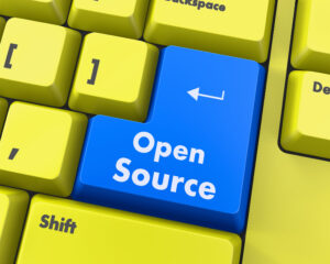 Ausschnitt eines Computer-Keyboards, bei dem die Return-Taste die Aufschrift "Open Source" trägt.