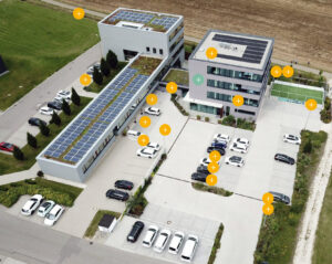 Luftaufnahme des Smart City Campus -farbige Punkte markieren verschiedene smarte Funktionen und technologien.