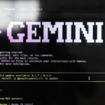 Abfotografierter Bildschirm mit Schriftzug "Gemini" und einigen Code-Zeilen in Pixelschriftart