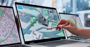 Auf einem Monitor ist der Digitale Zwilling einer Stadt zu sehen